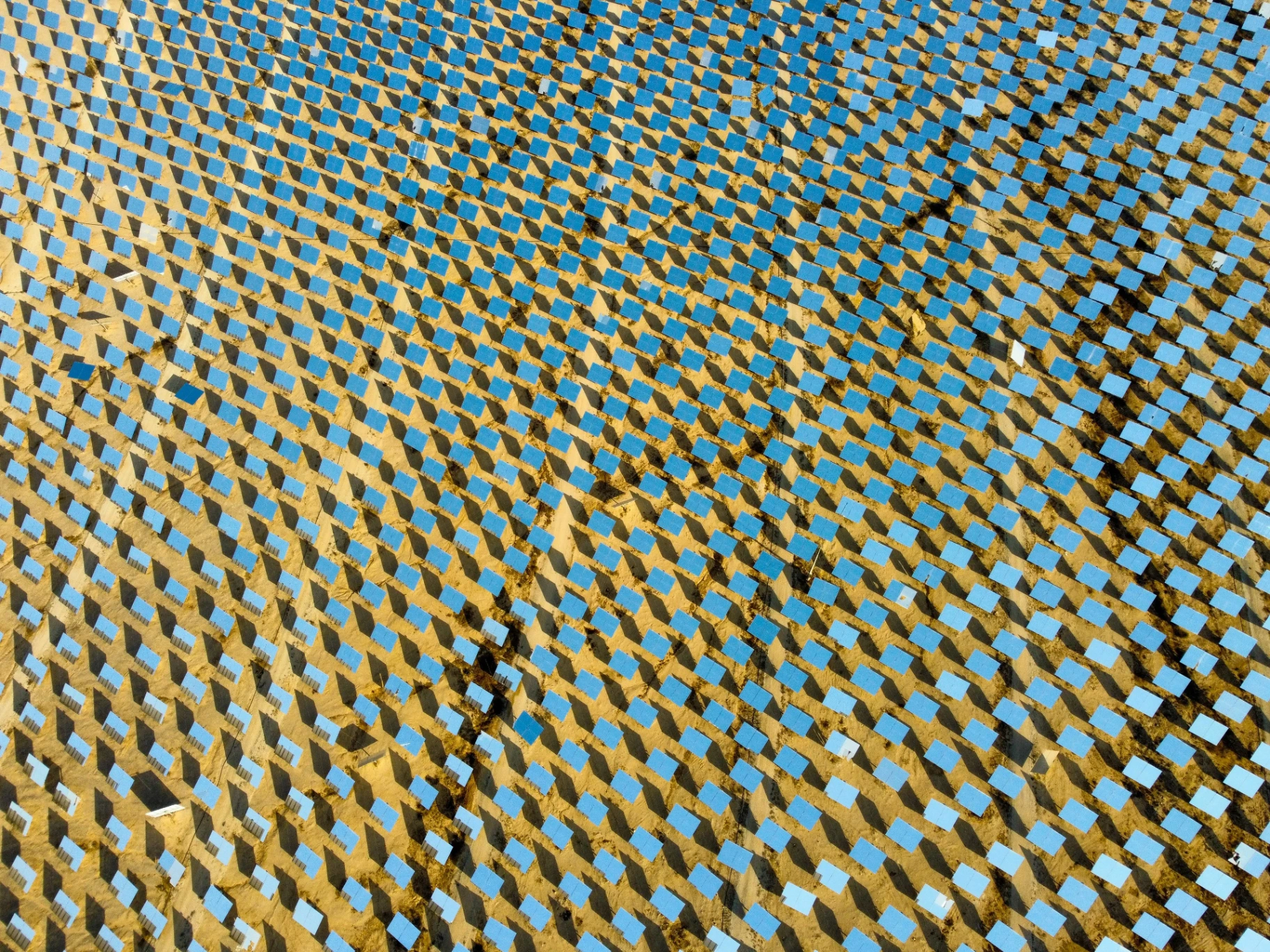 Aerial view of a large-scale solar panel field